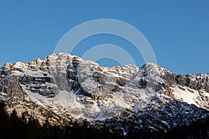 Veliko Å¡piÄje mountain peak covered in snow